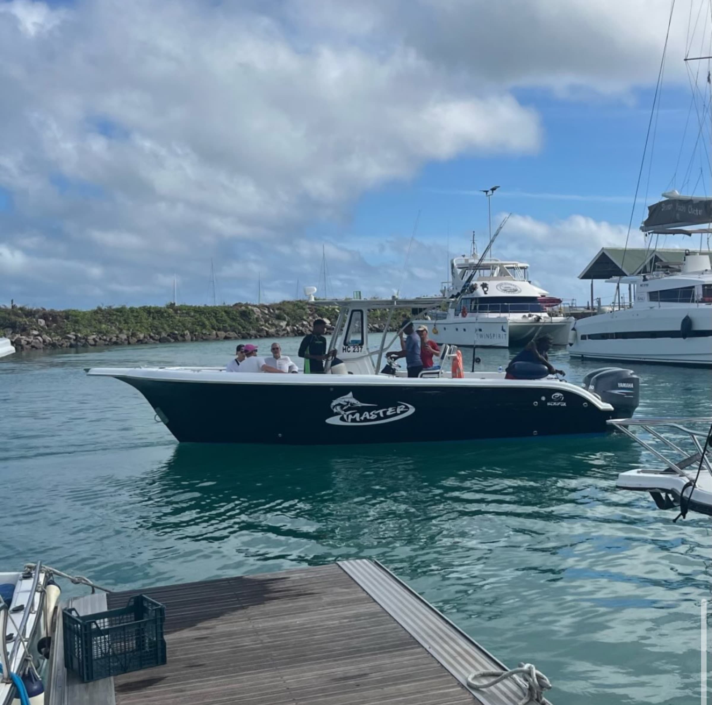 Our Seychellois captain with the Master Boat at La Digue marina